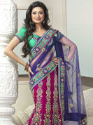 Take a look on the changing fashion of the season.  This blue and magenta lehenga saree is beautifully designed with extensive embroidered border and butti patch work. Embroidery is done with resham, zari and sequins work. This fabulous party wear saree is specially crafted for your stunning and gorgeous look. This beautiful drape is crafted with net and georgette fabric. Matching blouse come along with this saree. Slight color variations are possible due to differing screen and photograph resolution.