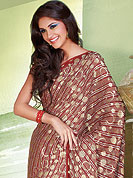 Be the cynosure of all eyes with this exquisite range of party wear sarees in flattering colors and combinations. This collection of Silk Sarees ,flaunt your feminine grace and glamour in this smart and trendy wear collection of sarees. Designer  Saree in material  with silk worked  with heavy print  work all over the saree and  embroidered lace on border. Slight Color variations possible due to differing screen and photograph resolutions.