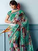 Attract all attentions with this printed saree. This beautiful and pretty printed saree nicely designed with Stylish floral pattern. The saree is specially crafted for your stunning look and terrific style. This saree material is georgette. Matching Blouse is available. Slight color variations are possible due to differing screen and photograph resolution.