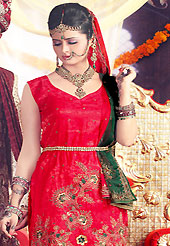 Attract all attentions with this embroidered suit. The dazzling red salwar kameez have amazing embroidery patch work is done with sequins, zardosi and stone work. The entire ensemble makes an excellent wear. Matching salwar and dupatta is available with this suit. Slight Color variations are possible due to differing screen and photograph resolutions.