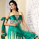 Turquoise Green and Cream Net Churidar Kameez with Dupatta