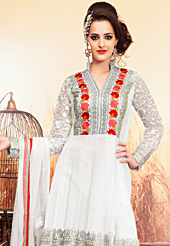 Get ready to sizzle all around you by sparkling suit. The dazzling off white net anarkali churidar suit have amazing embroidery patch work is done with resham, zari and lace work. Beautiful embroidery work on kameez is stunning. The entire ensemble makes an excellent wear. Matching santoon churidar and chiffon dupatta is available with this suit. Slight Color variations are possible due to differing screen and photograph resolutions.