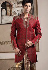 Emblem of fashion and style, each piece of our range of Designer Sherwani is certain to enhance your look as per todays trends pure banarasi silk worked with stones, zardosi and cutdana. A contrasting dhoti are enhanced your personality. Outfit is a novel ways of getting yourself noticed. A heavy embroidery on front border, collar and cuffs are enhanced your personality. Slight Color variations possible due to differing screen and photograph resolutions.