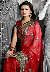 Dreamy variation on shape and forms compliment your style with tradition. This shaded red shimmer faux georgette saree is nicely designed with embroidered and tissue patch work in fabulous style. Embroidery is done with resham, zari, sequins, stone, cutdana, kasab and cut motti work in form of floral motifs. Beautiful embroidery work on saree make attractive to impress all. This saree gives you a modern and different look in fabulous style. Matching blouse is available with this saree. Slight color variations are possible due to differing screen and photograph resolution.
