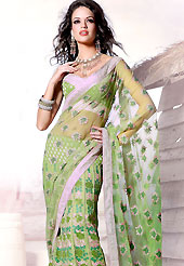 Emblem of fashion and beauty, each piece of our range of designer saree is certain to enhance your look as per today’s trends. This green net lehenga style saree is beautifully adorned with resham, zari and patch work in floral patterns. As shown blouse can be made possible and also can be customized as per your style subject to fabric limitation.  Slight color variations are possible due to differing screen and photograph resolution.