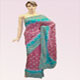 Heavy stone work saree with two shaded blue and gray golden pearl work on all over border